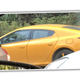 Image for article titled Help Us Identify This Really Weird Yellow Sedan UPDATED